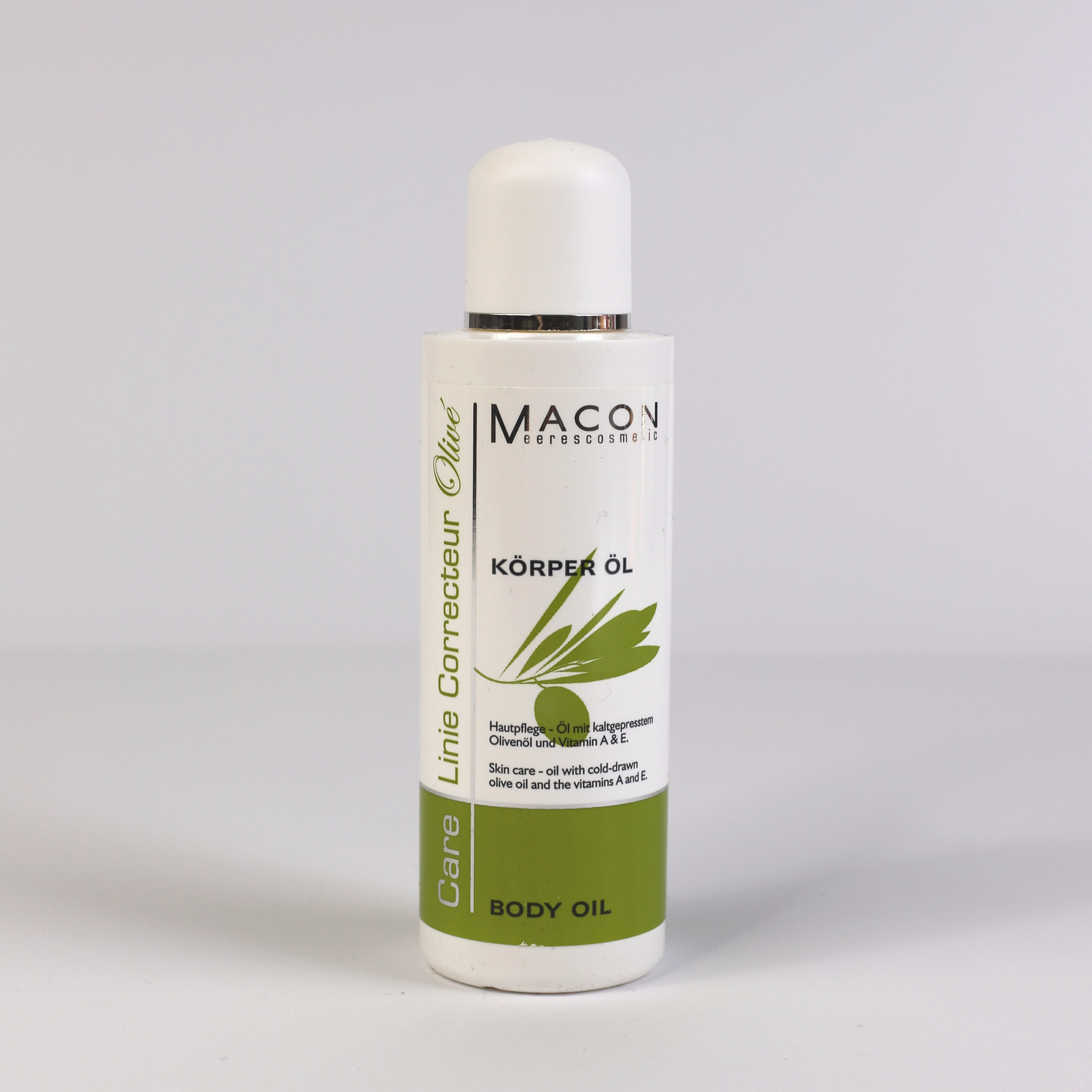 Macon Meerescosmetic Olivé Body Öl neben einem Olivenzweig.